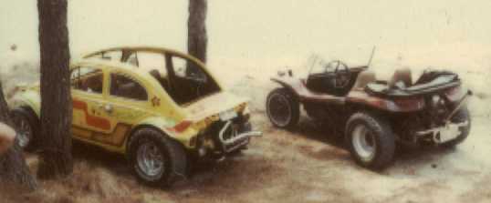 My yellow VW Baja Bug on beach with dunebuggy.